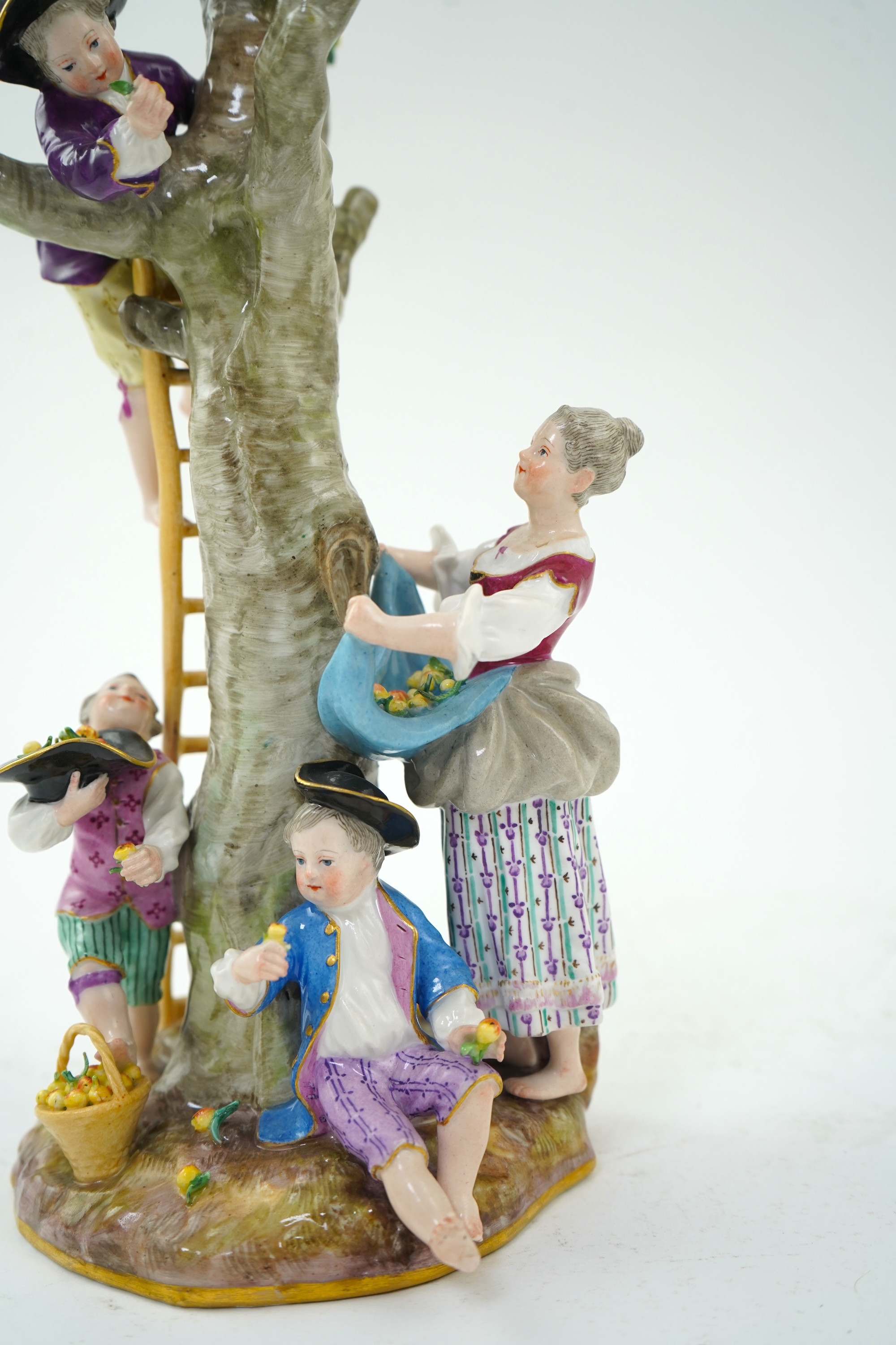 A Meissen group of apple pickers, 19th century